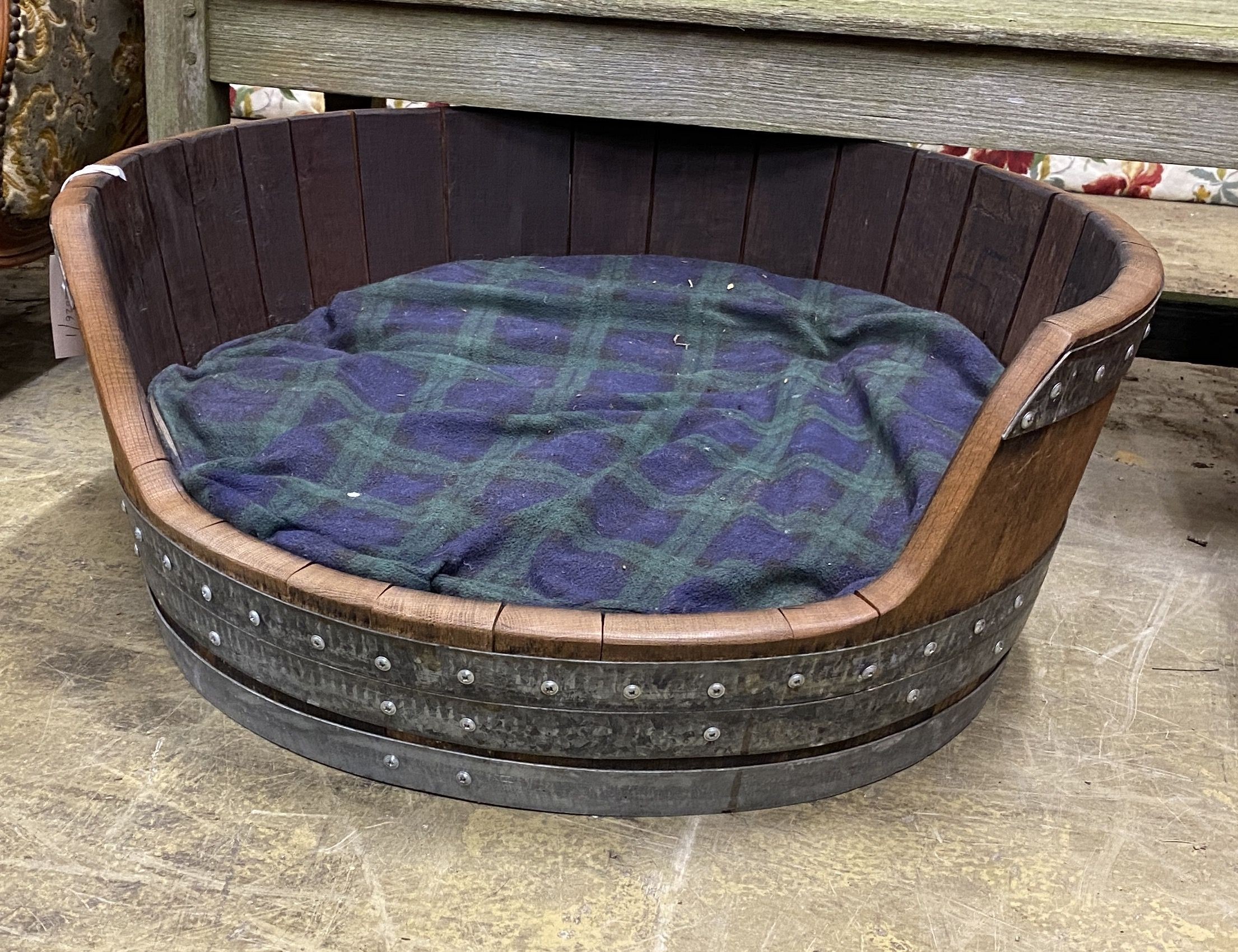 A metal bound oval staved oak dog's bed, width 70cm, depth 68cm, height 29cm